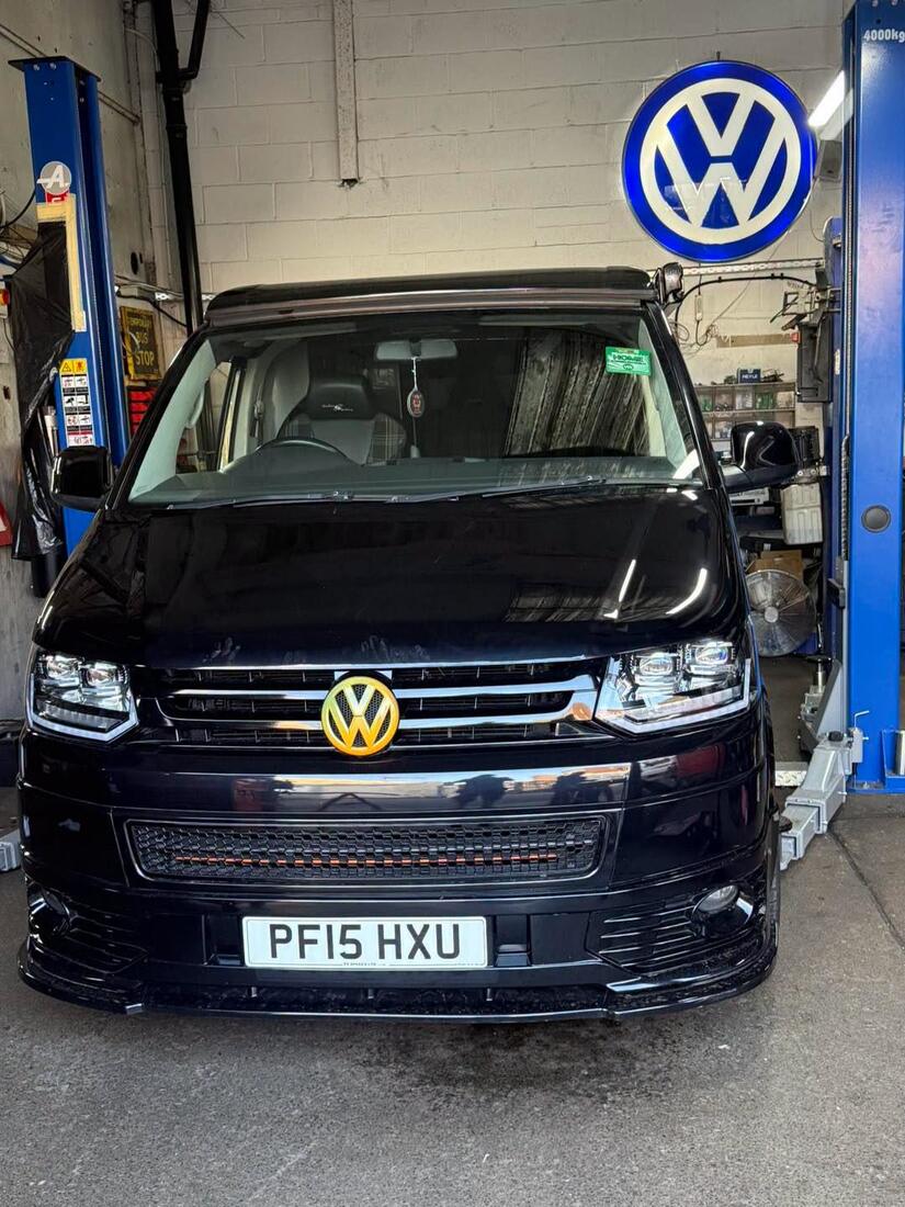 VW Transporter T5 up on the ramp in the T5 Spares workshop, Fleetwood